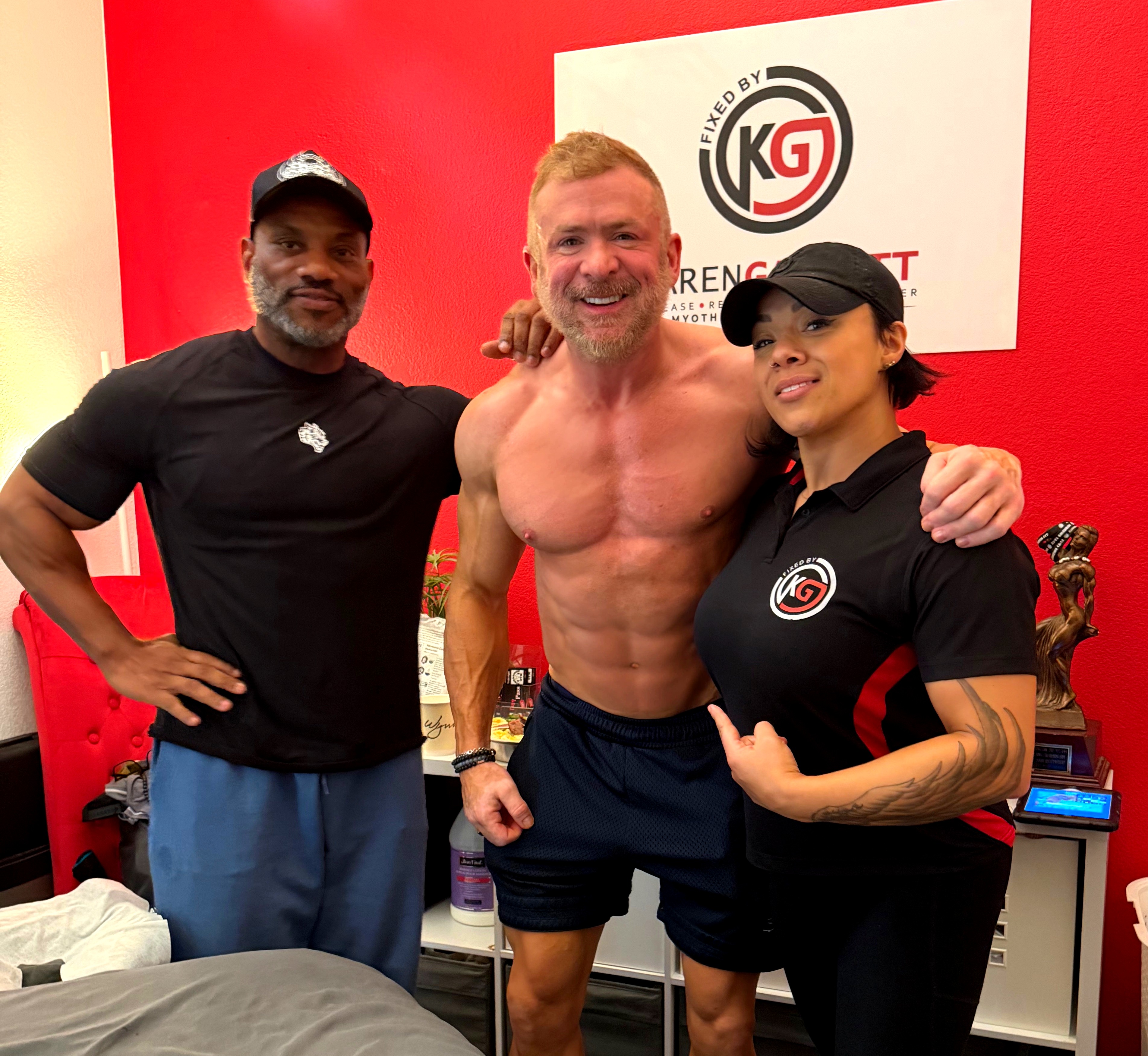 Karen Garrett with athletes at Fixed by KG